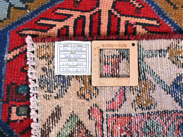 a close up of a rug with a tag on it