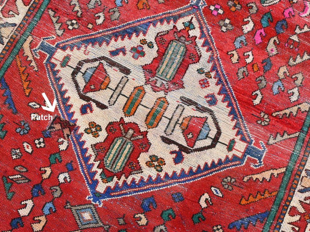 a close up of a rug with a pattern on it