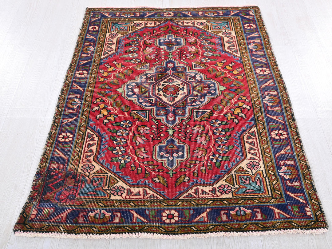 a large oriental rug on a white floor