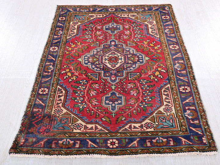 a large oriental rug on a white floor