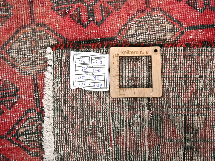 a piece of wood sitting on top of a rug