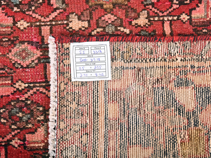 a pile of rugs with a price tag on them