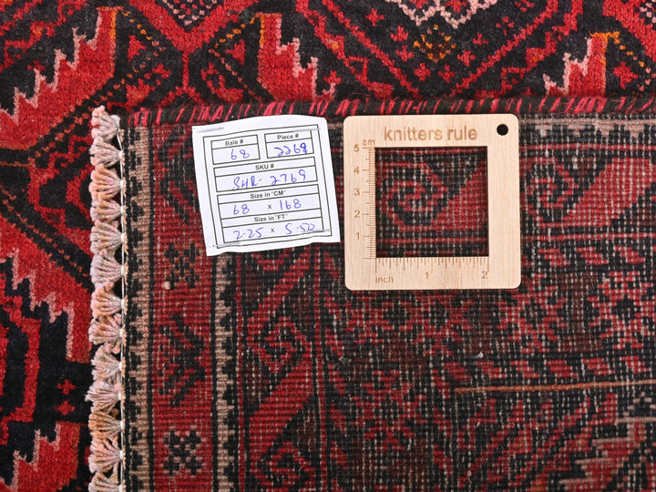 a piece of wood sitting on top of a rug