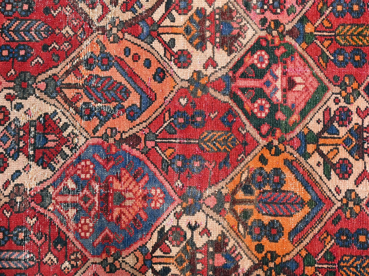 an old rug with a lot of different colors