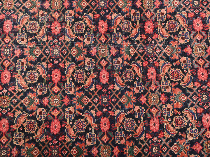 an oriental rug with a red and blue design
