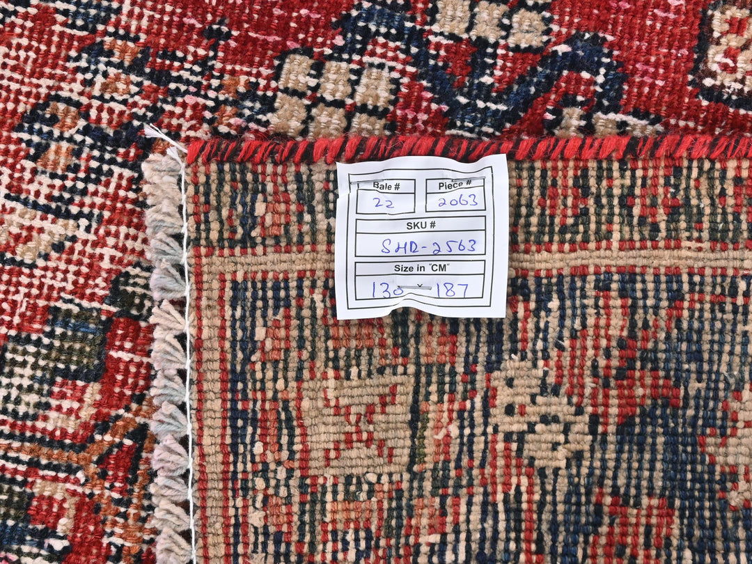 a piece of paper on top of a rug