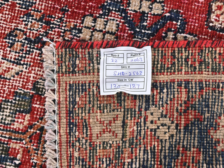a piece of paper on top of a rug