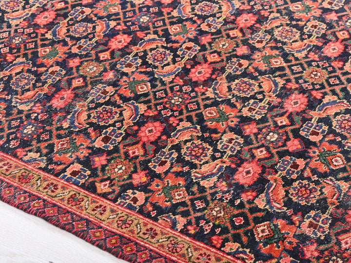 an oriental rug is laying on the floor