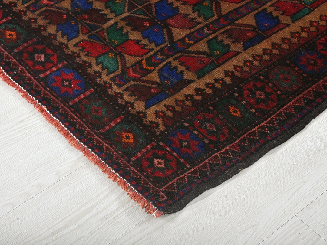 a close up of a rug on a white floor