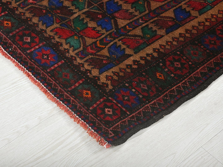 a close up of a rug on a white floor