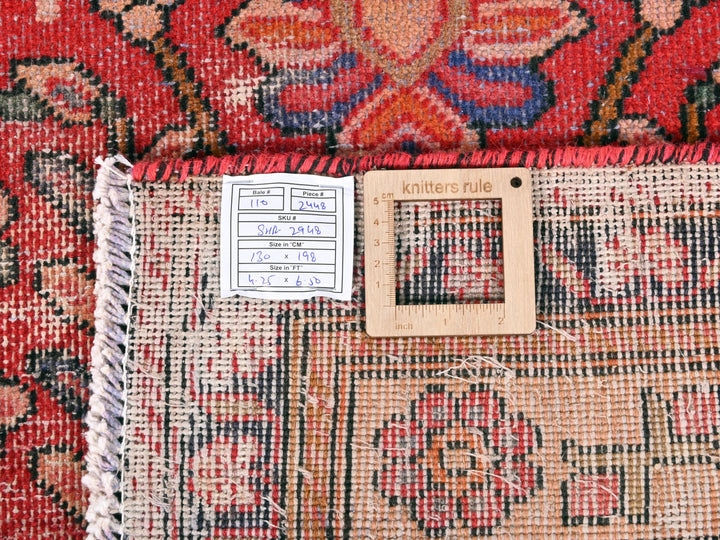 a close up of a rug with a tag on it