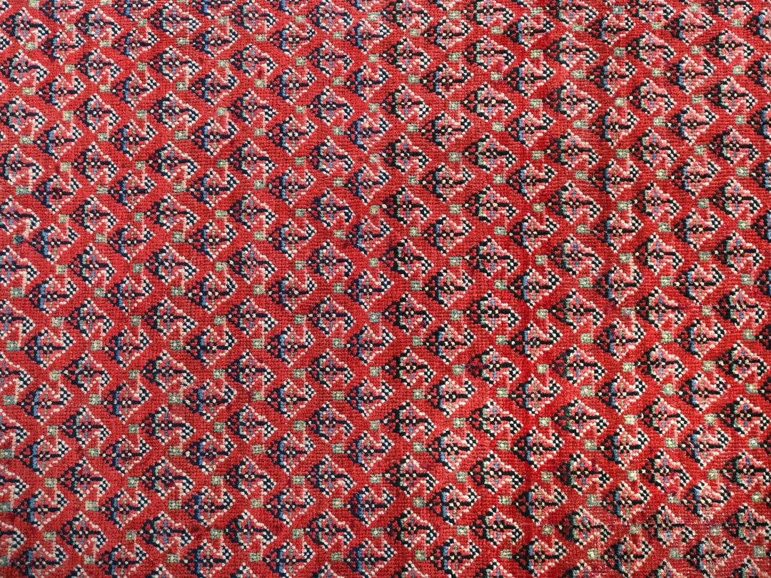 a close up of a red, black, and white cloth