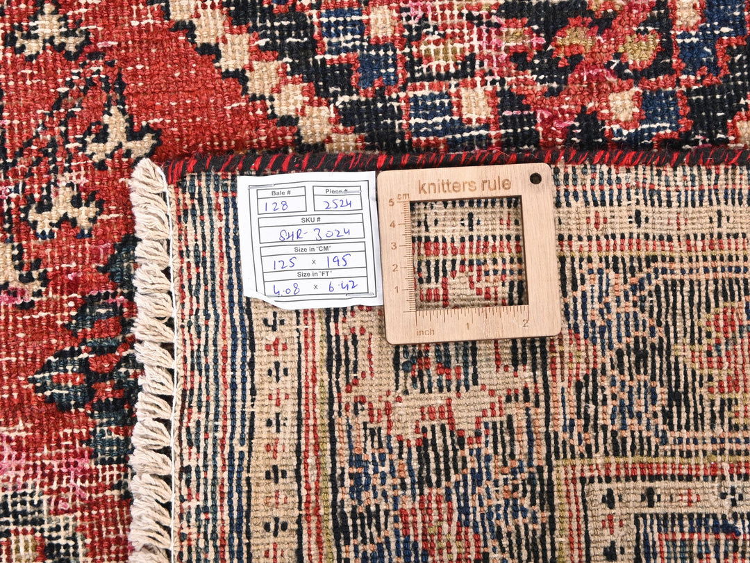 a close up of a rug with a tag on it