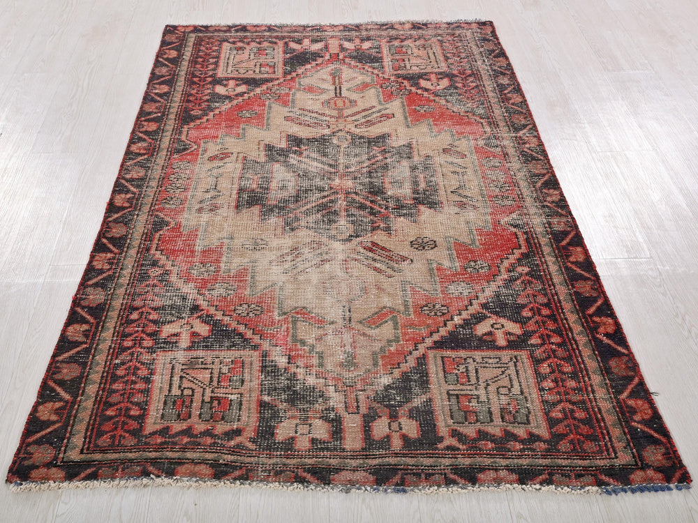 a large oriental rug on a wooden floor