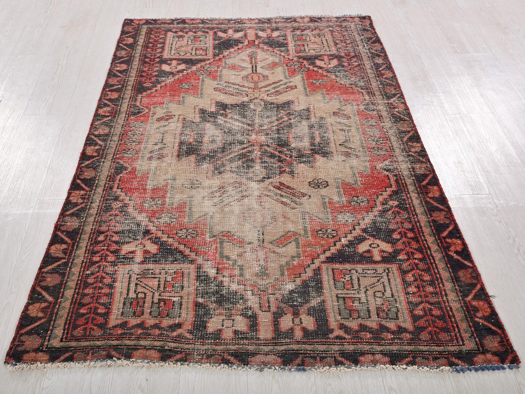 a large oriental rug on a wooden floor