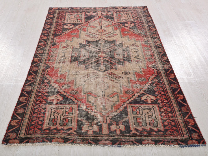a large oriental rug on a wooden floor