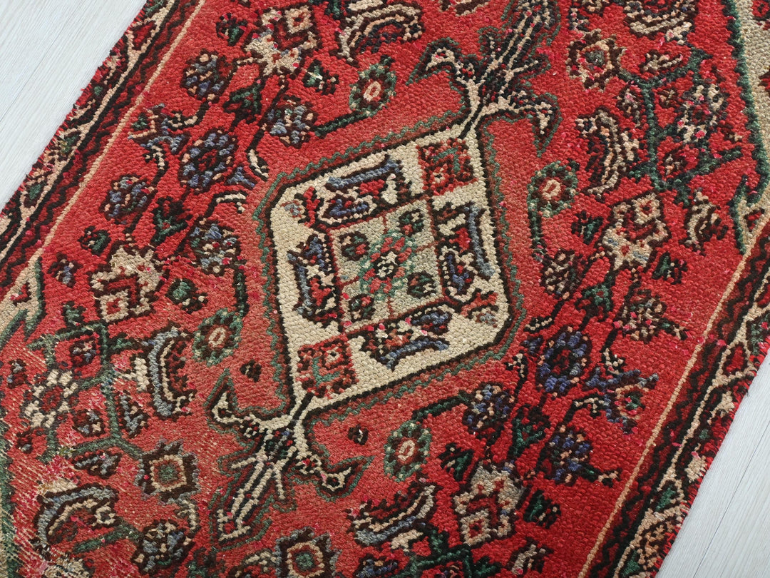a close up of a rug on a wooden floor