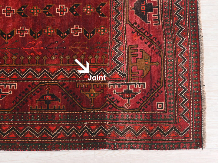 a close up of a rug with a white arrow pointing to it