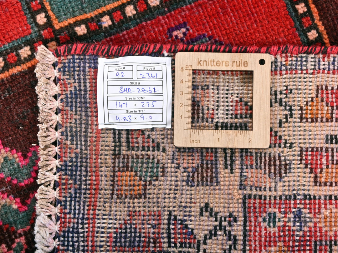 a piece of wood sitting on top of a rug