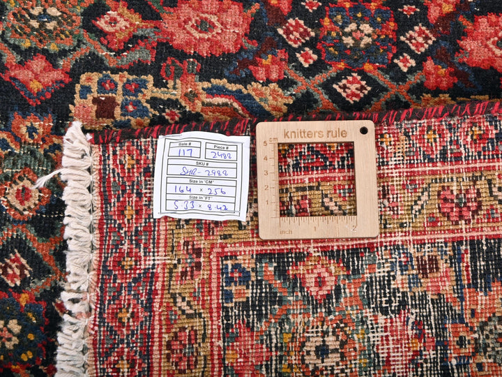 a piece of wood sitting on top of a rug