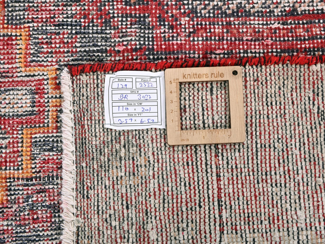 a piece of wood sitting on top of a rug