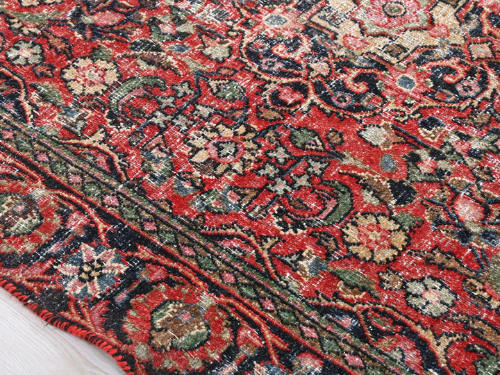 a close up of a rug on a wooden floor