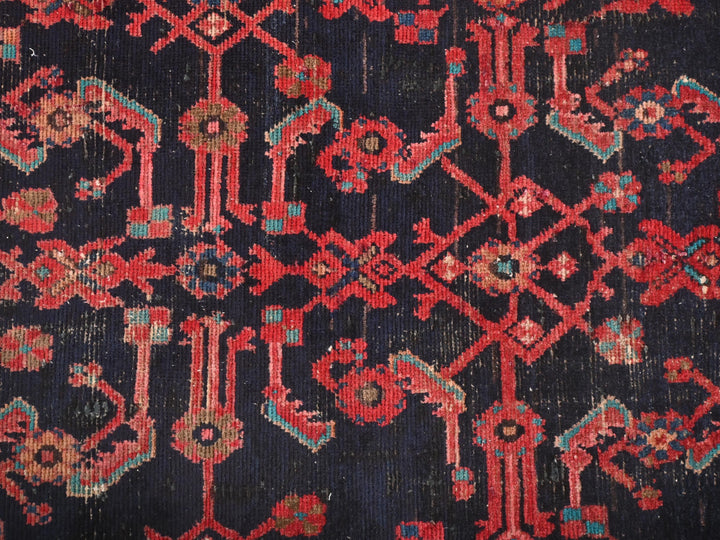 a close up of a red and blue rug