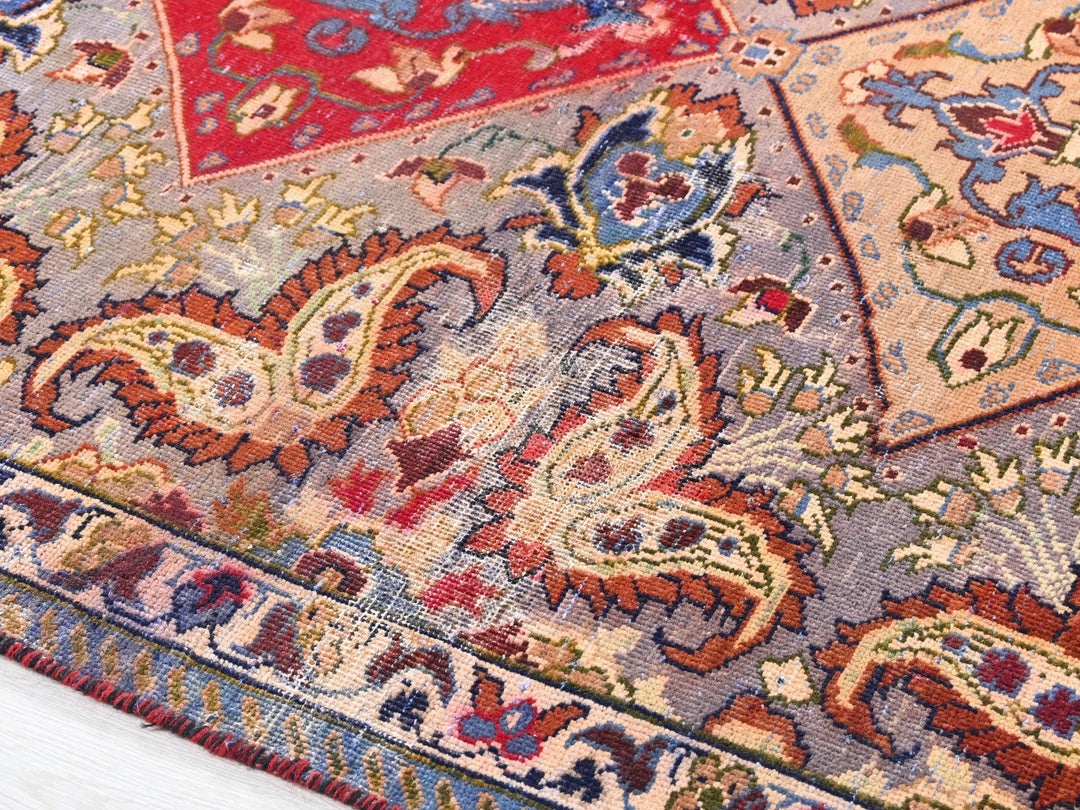 a close up of a colorful oriental rug