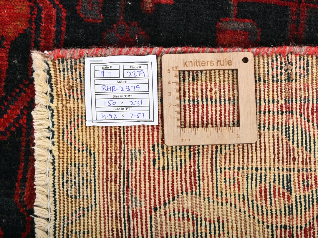 a close up of a rug with a tag on it