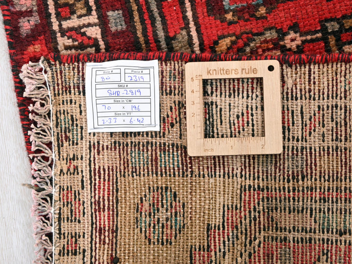 a piece of wood sitting on top of a rug