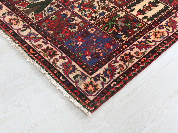 a multicolored oriental rug on a white floor