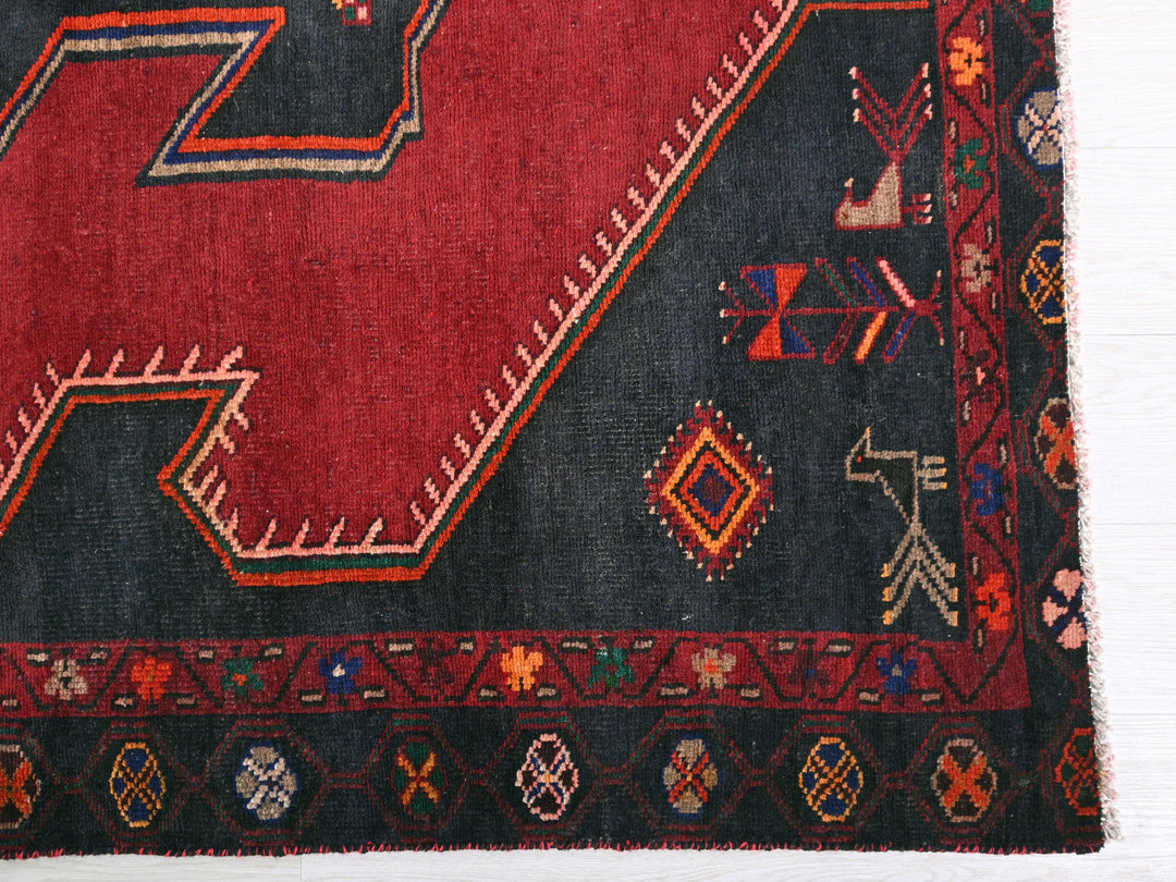 a red rug with a number seven on it