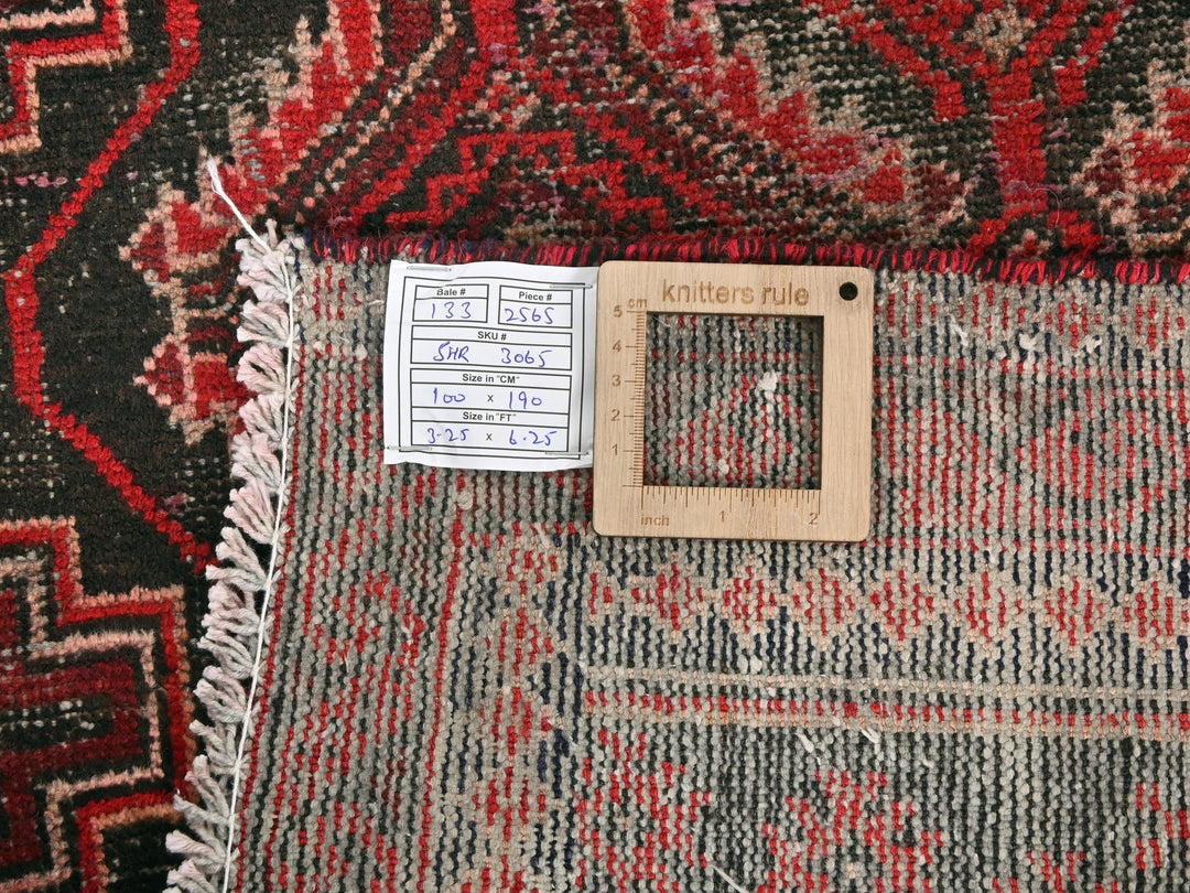 a piece of wood sitting on top of a rug