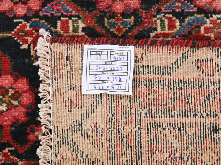 a close up of a rug with a tag on it