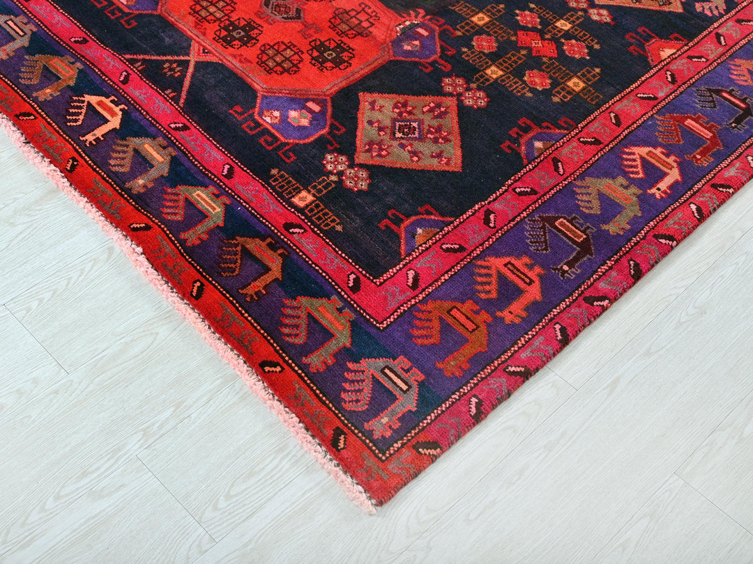 a colorful oriental rug on a white floor