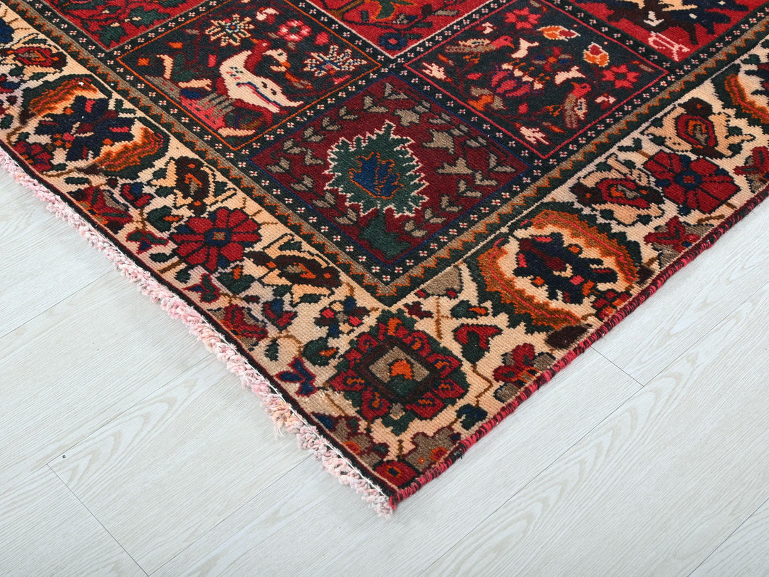 a red and blue rug on a white floor