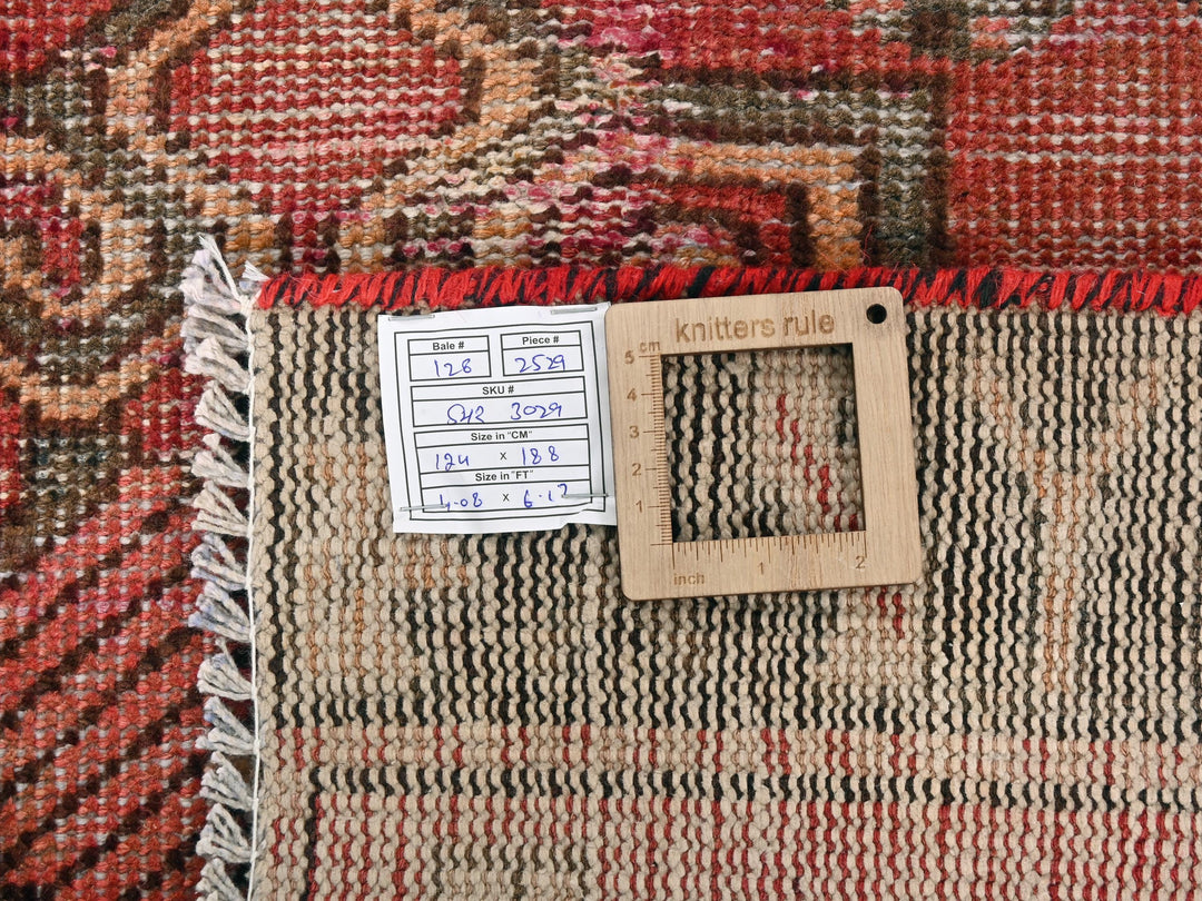 a close up of a rug with a tag on it