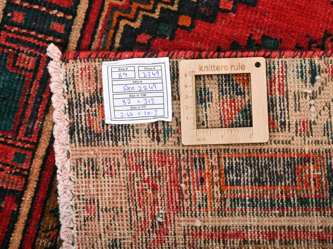 a close up of a rug with a ruler on it